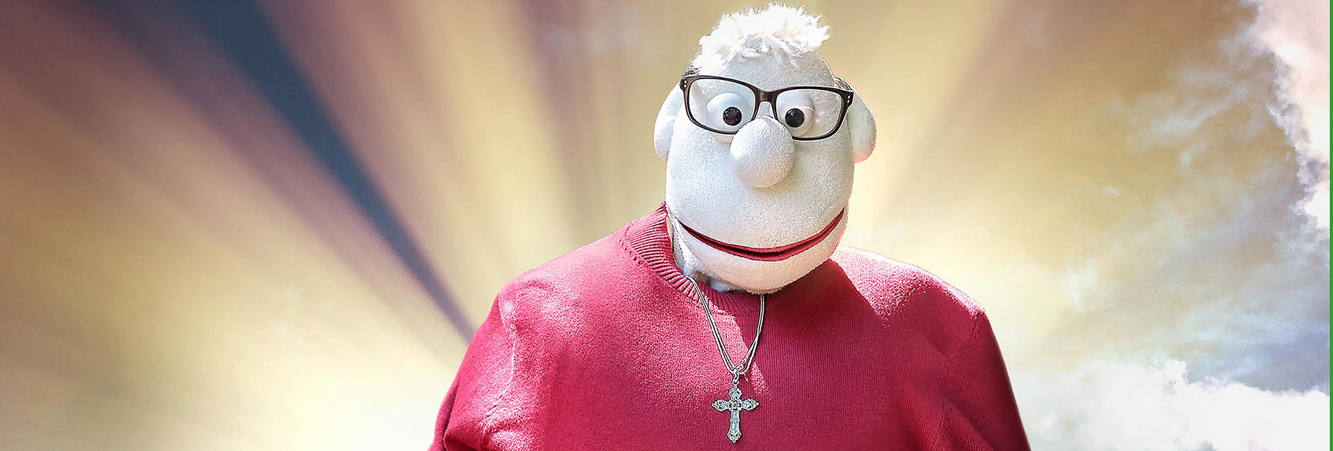 Werner Momsen mit Kreuz vor himmlischem Hintergrund